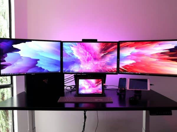 black flat screen tv on white wooden table